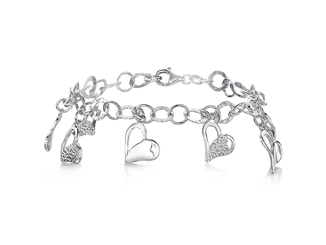 A sterling silver charm bracelet with dangly heart-shaped charms and additional cubic zirconia -JOOLS by Jenny Brown