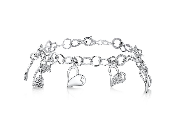 A sterling silver charm bracelet with dangly heart-shaped charms and additional cubic zirconia -JOOLS by Jenny Brown
